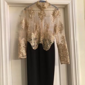 Elegant black and gold lace dress